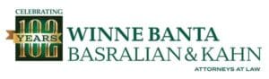 Banner for the community-based Winne Banta Basralian & Kahn law firm, celebrating 100 years, featuring green and gold colors with their logo.