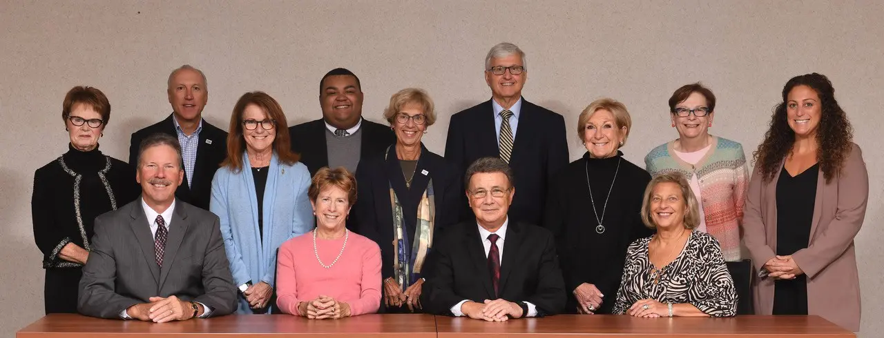 A group of people posing for a photo during a programs event.