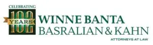 Banner for the community-based Winne Banta Basralian & Kahn law firm, celebrating 100 years, featuring green and gold colors with their logo.