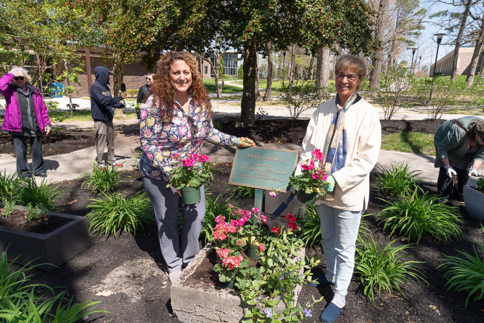 CCCEF Executive Director Dr. Maria LeBlanc and Foundation Board Member Ms. Ginger Chase plant the first flowers.