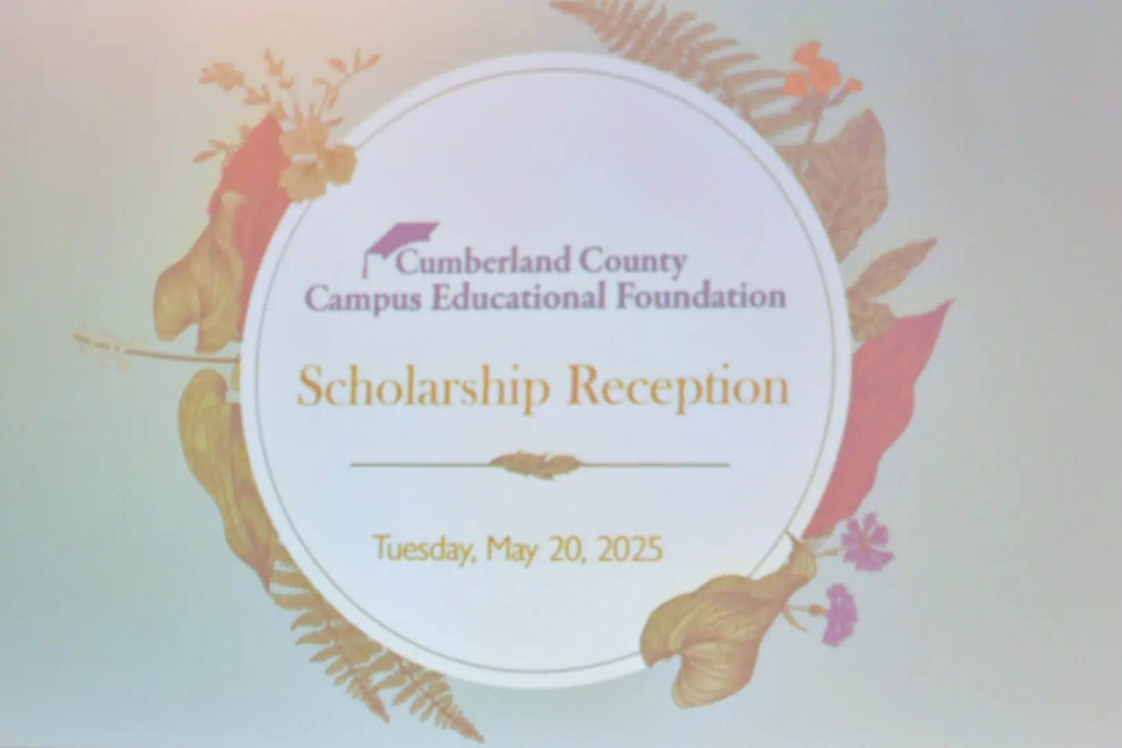 Invitation for a scholarship reception with floral design.